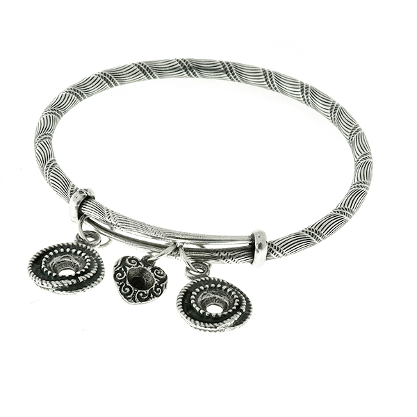 Metal casting charms on bangle bracelet base with wavy lines pattern 