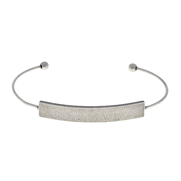 Adjustable bangle with solid bar in the center