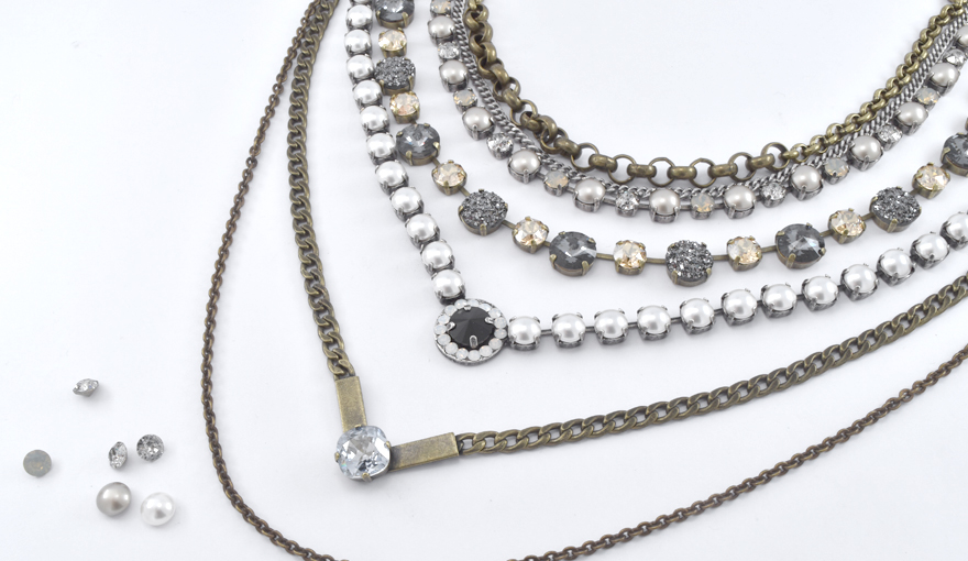  Layers of necklaces with crystals and pearls 
